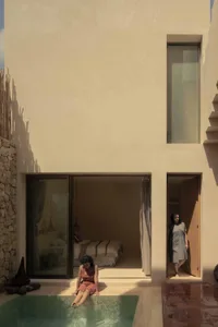 A minimalist house featuring a concrete pool.