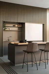 Modern minimalist kitchen with metallic shelving and wooden countertops.