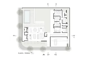 Modern residential floor plan featuring concrete materials and a minimalist design