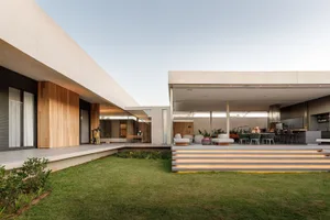 Modern residential patio featuring concrete and glass elements