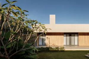 A modern architectural design featuring wooden materials.