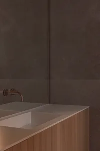 A minimalist bathroom with a modern concrete design