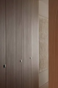 Modern interior design featuring wooden paneling and minimalist aesthetic