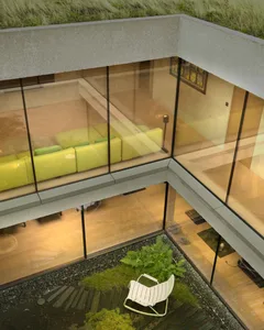 Modern living room with glass walls and concrete elements