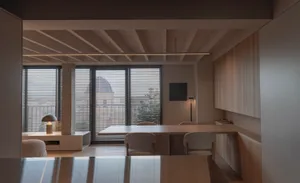 Contemporary office space featuring concrete and wood materials.