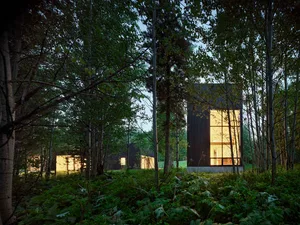 Modern residential architecture featuring wooden materials.