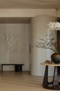 A modern lobby featuring concrete elements.