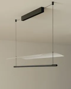Black metal suspended lighting fixture with simple geometric shapes
