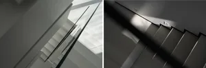 Glass staircase with minimalistic design and white walls