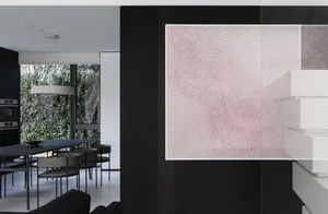 Modern minimalist interior with black metal accents.