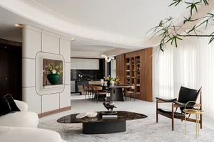 A modern living room with marble coffee table, leather seating, wooden accents, and glass cabinets.