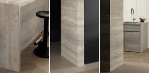Close-up of a modern kitchen featuring a sleek concrete countertop and minimalist design elements.
