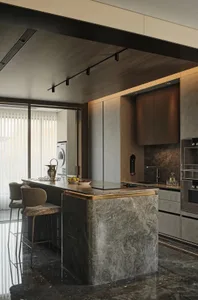 A modern kitchen featuring a granite island with a minimalist design.