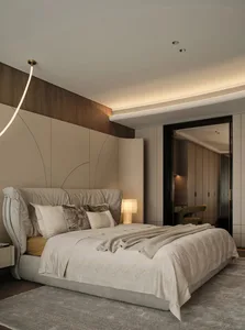 A modern minimalist bedroom with a beige upholstered bed and a wooden headboard.