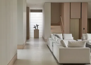 A contemporary living space with modern furniture and neutral color palette