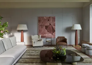 A sophisticated modern leather living room with minimalist decor.