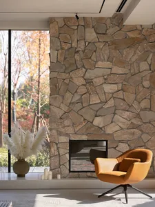 Contemporary living room featuring stone walls for a warm, natural atmosphere