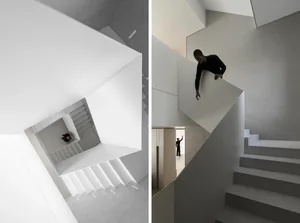 Modern interior featuring a minimalist concrete staircase