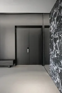 Concrete entrance with simple design in a modern interior setting.