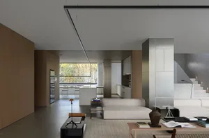 Modern, spacious living room with open concept layout.