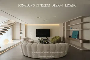 一間現代簡約客廳，配有曲線家具、大型平面電視，以及簡約裝飾。