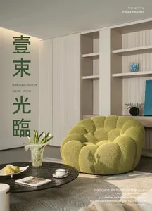 A modern living room featuring a green, bubble-textured lounge chair, a round glass table with a book, fruit, and a coffee cu