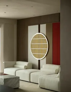 A modern living room with a white modular sofa, wood paneling, and glass elements.