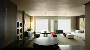 Modern living room with concrete and marble surfaces, featuring a minimalist design with large windows.