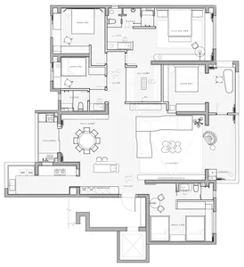 Detailed floor plan of a residential home with multiple bedrooms, bathrooms, living spaces, and laundry facilities.