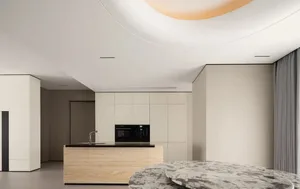 Modern kitchen featuring a wooden countertop and concrete flooring