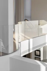 Modern residential interior with white walls and furniture