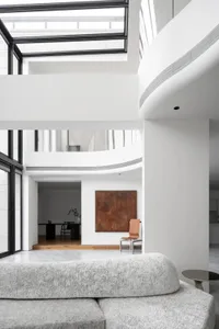 Modern interior featuring concrete and glass materials