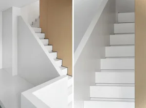 Modern white floating stairs with minimalist design.