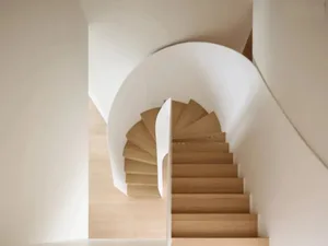 A minimalist staircase with wooden steps