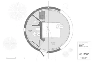 Circular bedroom floor plan with a bed in the center, an ensuite bathroom to the left, and a closet to the right.
