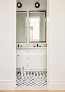 Modern bathroom with marble and glass elements