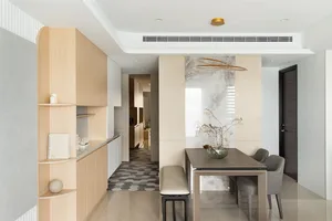 Modern minimalist dining room with wood and marble surfaces, ceramic tiles