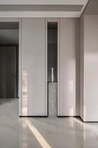 Minimalist interior design featuring concrete columns and sleek, clean lines.