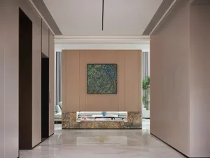 Modern living room featuring wooden paneling and marble flooring
