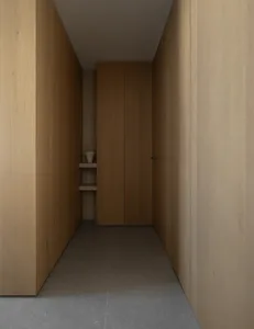 Modern bathroom with wood walls and concrete flooring.