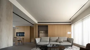 Modern living room featuring wooden panels and a minimalist design