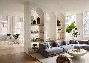 A modern living room with neutral-toned furniture and a minimalistic design.