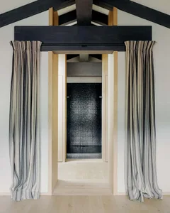 Modern interior design featuring textile curtains and minimalist architecture