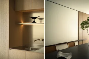 Modern minimalist kitchen featuring sleek wooden cabinets and a minimalist sink design