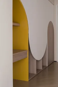 Modern entrance featuring circular openings.