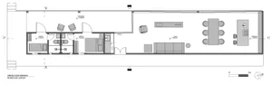 Floor plan of a modern residential space with a living room, kitchen, and bedrooms.