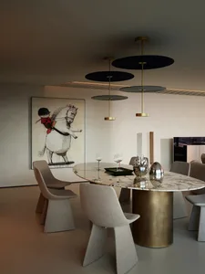 Modern dining room featuring a marble table and minimalist design