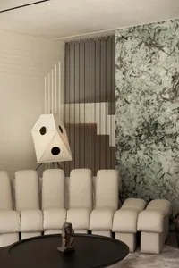Modern living room with white furniture, marble wall, and metallic accents.