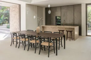 Contemporary kitchen featuring marble countertops and minimalist design