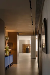 A modern interior design space featuring wooden materials.